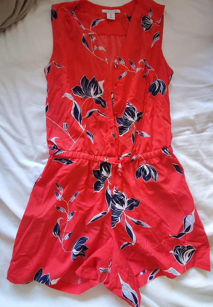 Cute romper with floral detail
